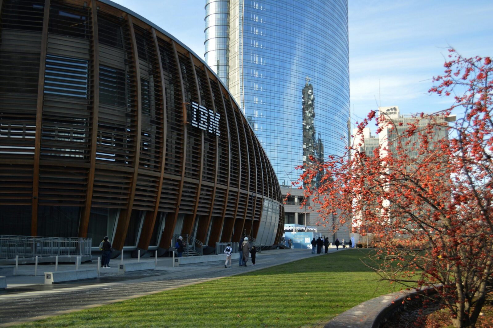 Contemporary architecture in Milan with skyscrapers and natural elements.